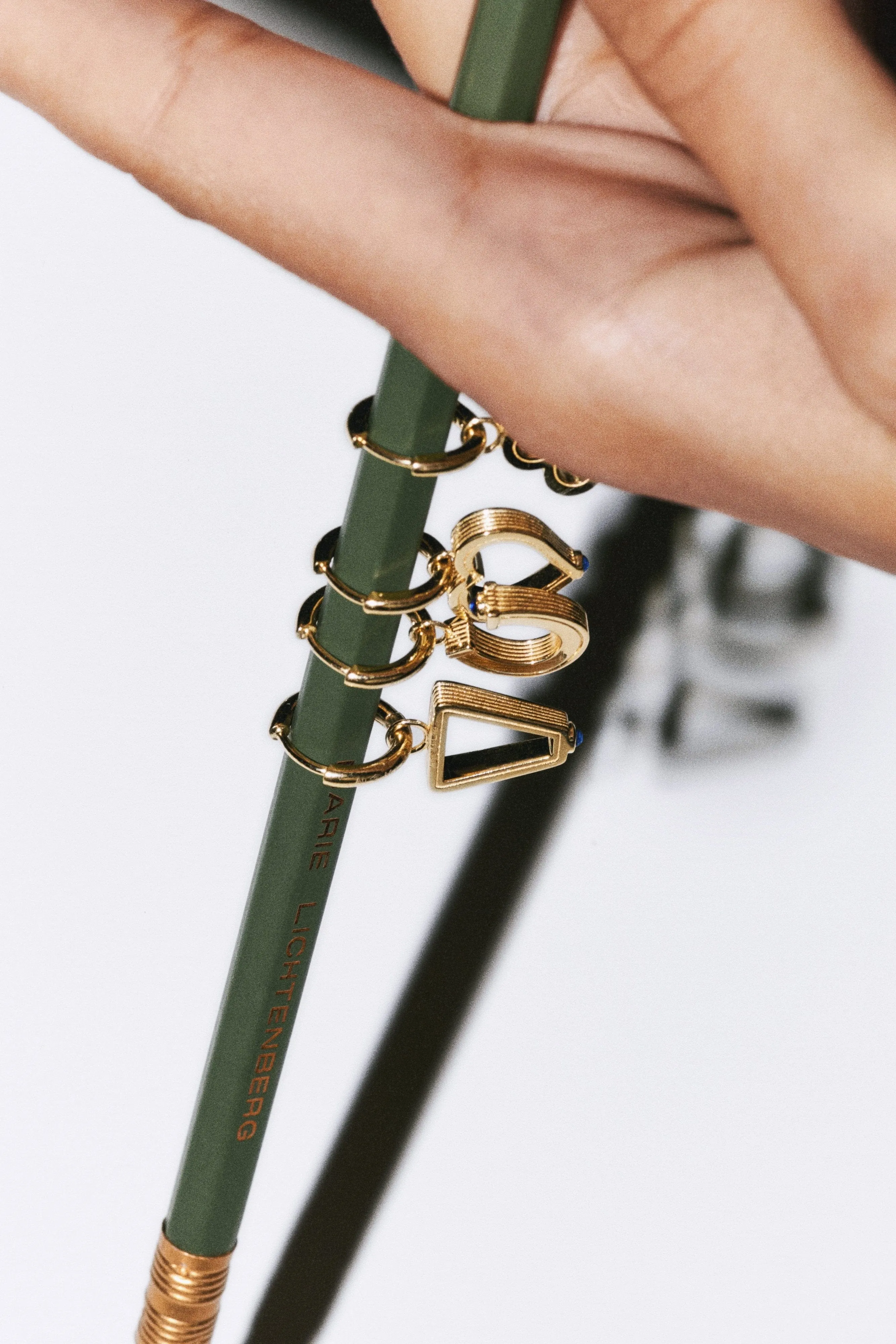 Baby charm Triangle earring