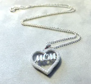 Heart Pendant Necklace That Says Mom in Sterling Silver