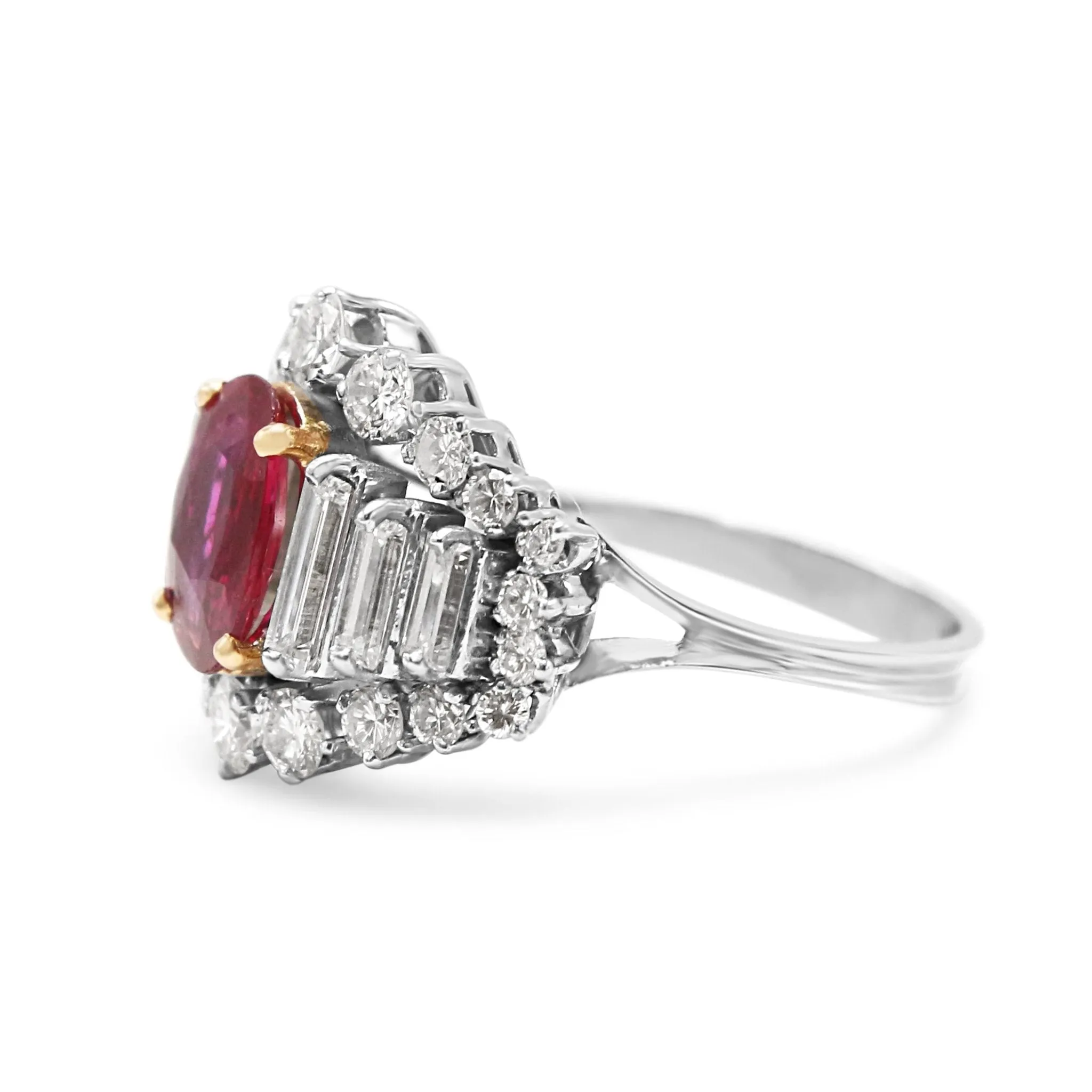 Oval Ruby Ring With Baguette & Brilliant Cut Diamond Surround