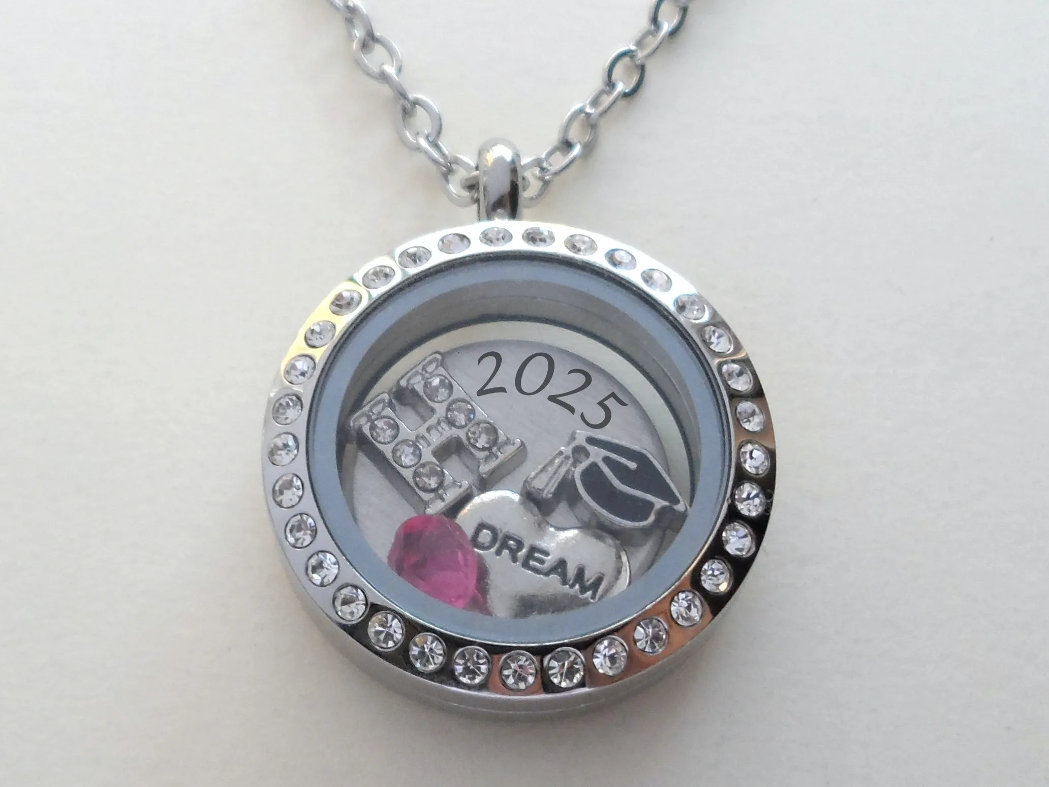 Personalized Graduation Floating Charm Locket Necklace with 2025 Disc, Graduate Cap, Letter and Birthstone Charm - by Jewelry Everyday